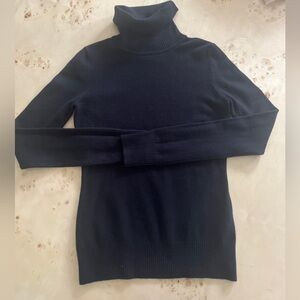 Black fitted turtleneck sweater